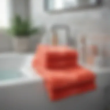 Aesthetic arrangement of coral washcloths in a modern bathroom setting