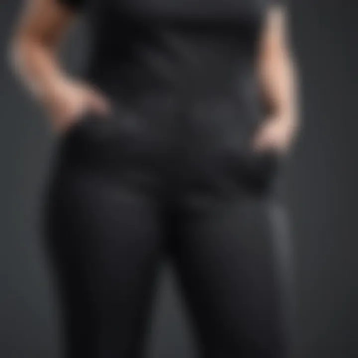 Close-up of the cut variations in plus size black straight leg pants