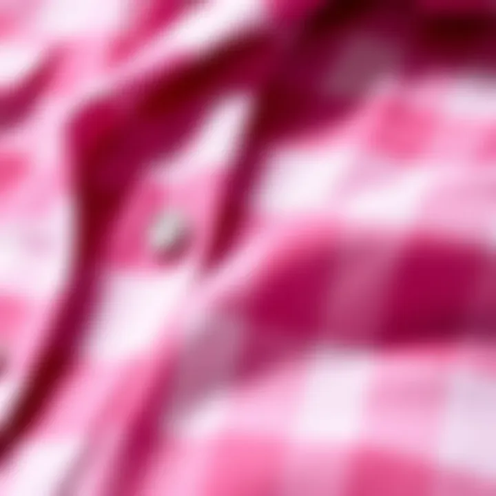 Close-up of the fabric texture of a pink flannel shirt emphasizing quality and comfort