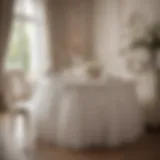 A beautifully arranged dining table adorned with a white tutu table skirt, showcasing elegance and charm.