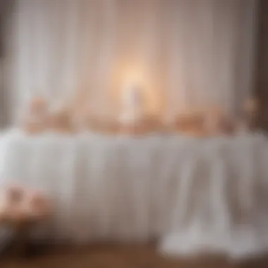 Stylish arrangement of a dessert table draped with a white tutu table skirt, creating a whimsical look.