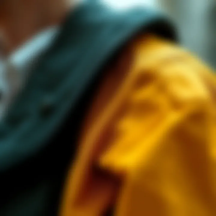 Close-up of the fabric and stitching details of a drop shoulder bomber jacket