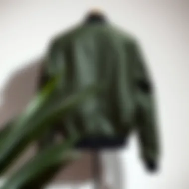 Stylish Display of Drop Shoulder Bomber Jacket A stylish drop shoulder bomber jacket showcased on a minimalist background
