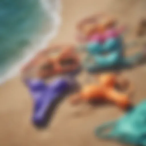 A vibrant array of thong bikinis displayed on a beach setting